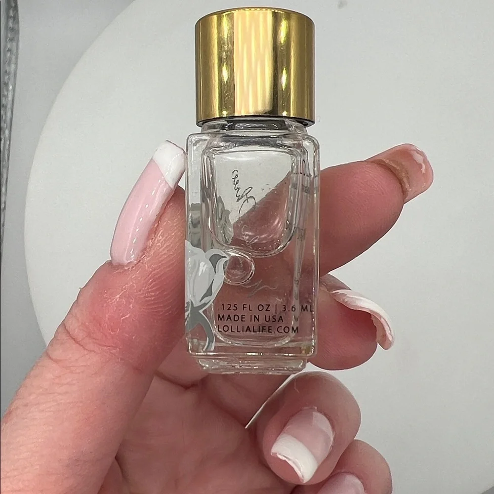 Lollia Elegance White Amber and Mirabelle Dabber .125oz 3.6ml